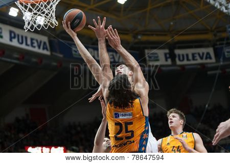 VALENCIA, SPAIN - DECEMBER 5: Luncar (15) defends during Euroleague match between Valencia Basket Club and Crvena Zvezda Telekom Belgrade at Fonteta Stadium on Dicember 5, 2014 in Valencia, Spain