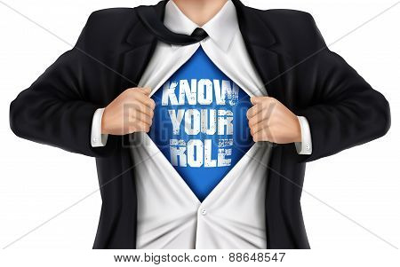 Businessman Showing Know Your Role Words Underneath His Shirt
