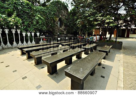 Jakarta, Indonesia, September 19, 2012 : People Praying At St. Marry Of Assumption Grotto At Jakarta