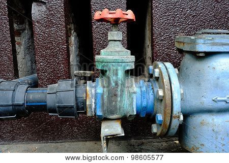 Old Or Grunge Rusty Industrial Tap Water Pipe And Valve