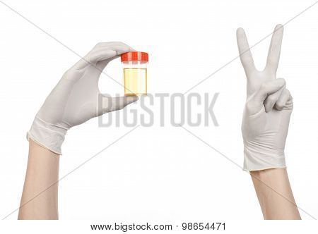 Medical Theme: Doctor's Hand In White Gloves Holding A Transparent Container With The Analysis Of Ur