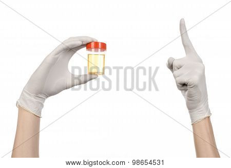 Medical Theme: Doctor's Hand In White Gloves Holding A Transparent Container With The Analysis Of Ur
