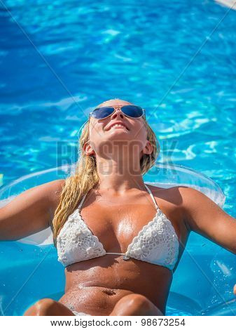 Top view of a  girl in the swimming pool