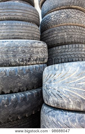 Stack Of The Old Used Tire Covers.