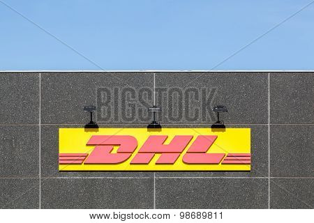 Skanderborg, Denmark - August 9, 2015: DHL logo on a facade.
DHL Express is a division of the german logistics company Deutsche Post DHL providing international express mail services.