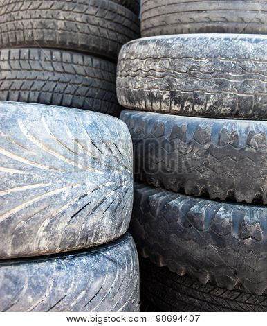 Stack Of The Old Used Tire Covers.