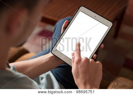 Person using the digital tablet in living room