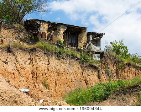 Landslide Caused By Torrential Rains Of Hurricane Christie. Broken Road Asphalt Cracked, And Came Do