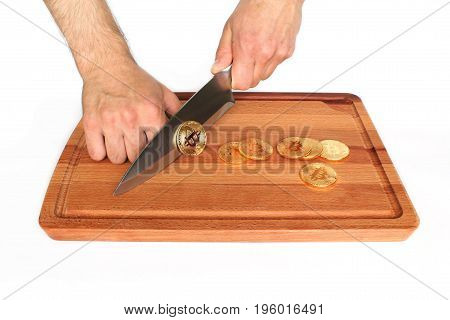Abstract extraction of Bitcoins. Cutting coins. Creative