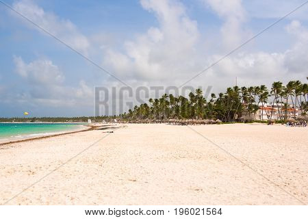 View Of The Sandy Beach In Punta Cana, La Altagracia, Dominican Republic. Copy Space For Text.