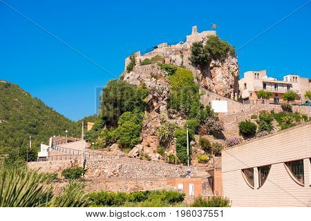 The Mountain Town Of Pratdip In Spain. Copy Space For Text. Isolated On Blue Background.