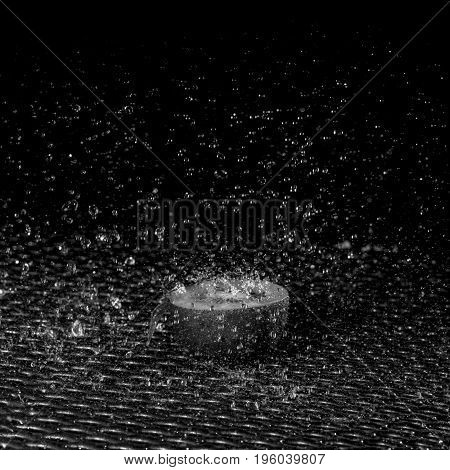 a half of a kiwi lying in the rain