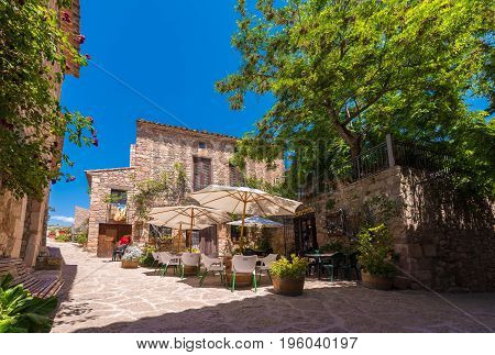 Siurana De Prades, Spain - June 26, 2017: View Of Buildings And Cafes In The Village. Copy Space For