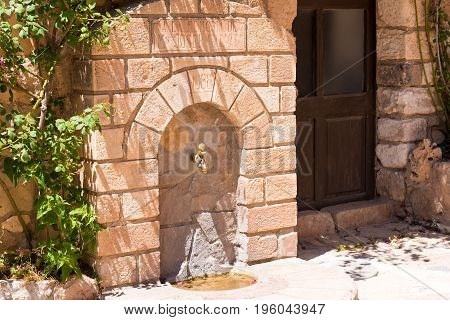 Antique The Water Tap In The Village Siurana De Prades, Tarragona, Catalunya, Spain.