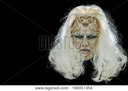 Demon Head With Grey Hair Isolated On Black