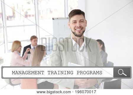 Concept of management training programs. Business trainer with team of managers on meeting in office