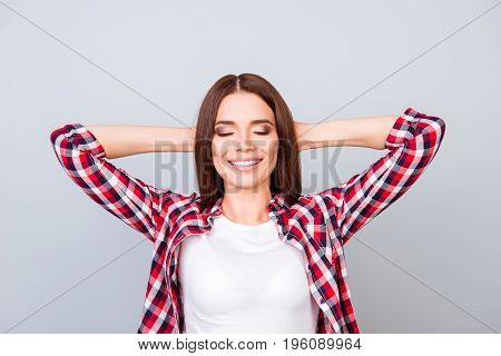 Time To Rest. Young Freelancer With Beaming Smile Is Relaxing, Hands Behind The Head, Dreaming And E