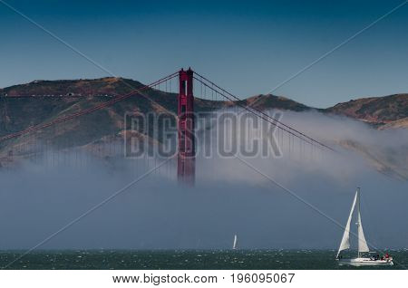 Sailing towards the Golden gate Bridge on a beautiful foggy day