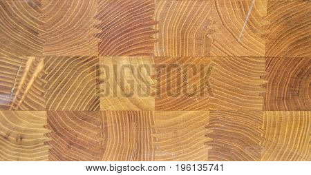 beautiful tiled wooden background texture with regular square wood elements pattern