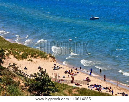 Kruse park beach with boat in water Muskegon Michigan