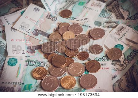 Paper money and coins on the table