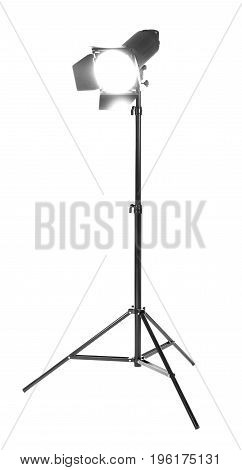 Studio lighting on a tripod stand, isolated on a white background. Professional studio equipment. Searchlight for cinema. Making movie single icon in black style bitmap.