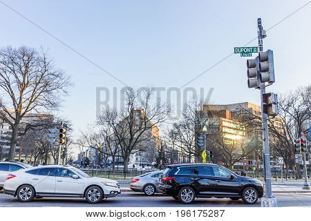 Washington DC USA - February 5 2017: Dupont circle with street sign and cars in winter