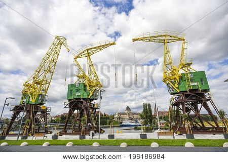 Renovated cranes on the boulevards in Szczecin on a sunny summer day