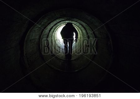 Life after death concept the light at the end of the dark tunnel