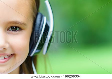 Copy Space And Hulf Face Of Young Attractive Caucasian Girl Listening Music With Professional Dj Hea