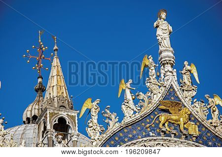 Overview of sculptures and frontispiece made in marble and gold on the San Marco Basilica. At the city of Venice, the historic and amazing marine city. Located in Veneto region, northern Italy