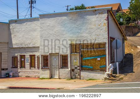 Boarded Up Store Front In Need Of Repair