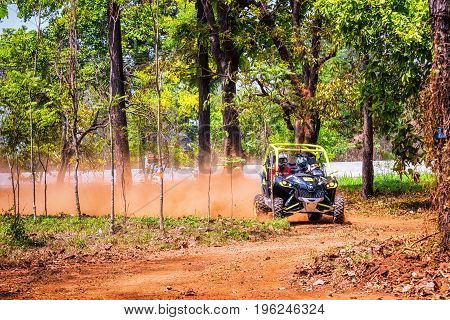 CHIANG MAI THAILAND - MAY 03: Undefined Driver on Side-by-Side Vehicles (UTV) on countryside roads May 03 2015 in Chiang mai Thailand.