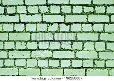 Grungy Green Color Brick Wall Pattern.