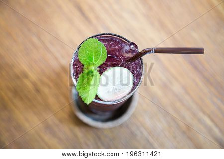 Pea lemon soda juice put on the table at the cafe