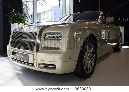 BERLIN - MARCH 08 2015: Showroom. Luxury car Rolls-Royce Phantom Drophead Coupe. Rolls-Royce Motor Cars Limited global manufacturer of luxury cars.