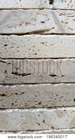 white marble slabs stacked up vertical texture