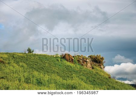 Overview of hill and fields on a cloudy day near the town of Frascati, a pleasant and well known place for its fine wines, near Rome. Located in the Lazio region, central Italy