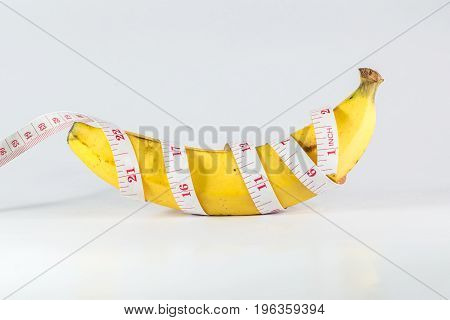 banana with measurement tape men penis size concept