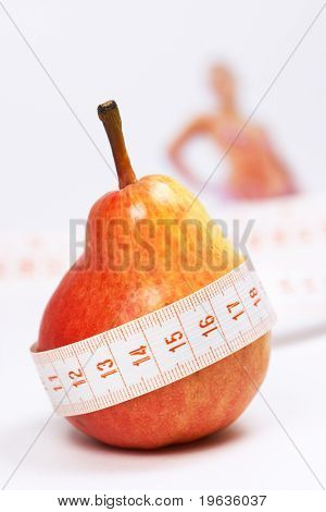 Overweight check-up (Red pear, blur woman on background)