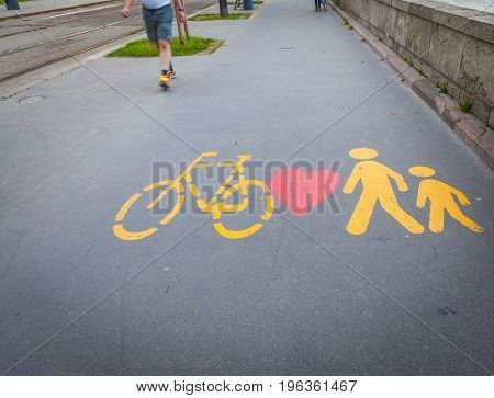 Bicycle Signs Painted On Asphalt