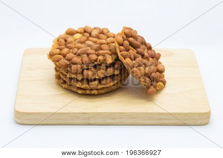 Fried sweet peanut on wooden board homemade Isolated