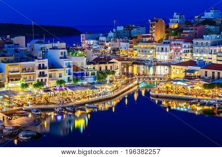 Aghios Nikolaos night view - picturesque town in the eastern of island Crete built on the northwest side of the peaceful bay of Mirabello