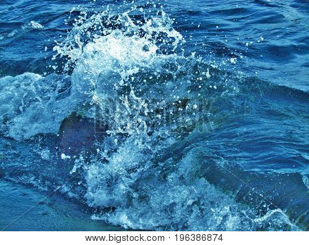 Waves crashing onto the beach in St.Kitts