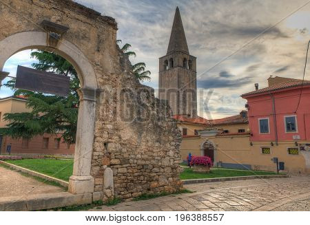 Old Arch in Dobrile Juraj Square Porec Istria. Coatia
