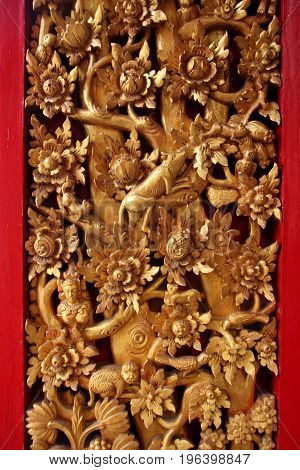 Traditional woodcraft, ancient art in thai temple.