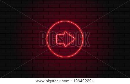 Neon Sign Arrow In A Circle On Brick Wall Background.