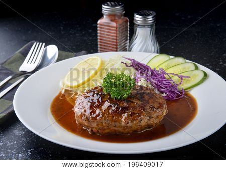 Japanese Style Hamberger Or Hamberg Serve With Gravy Sauce.