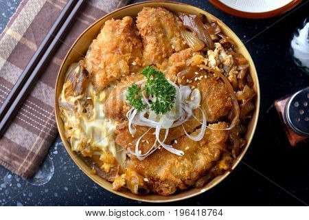 Katsudon Or Japanese Style Fried Pork Roast .