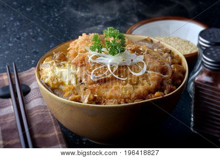 Katsudon Or Japanese Style Fried Pork Roast .